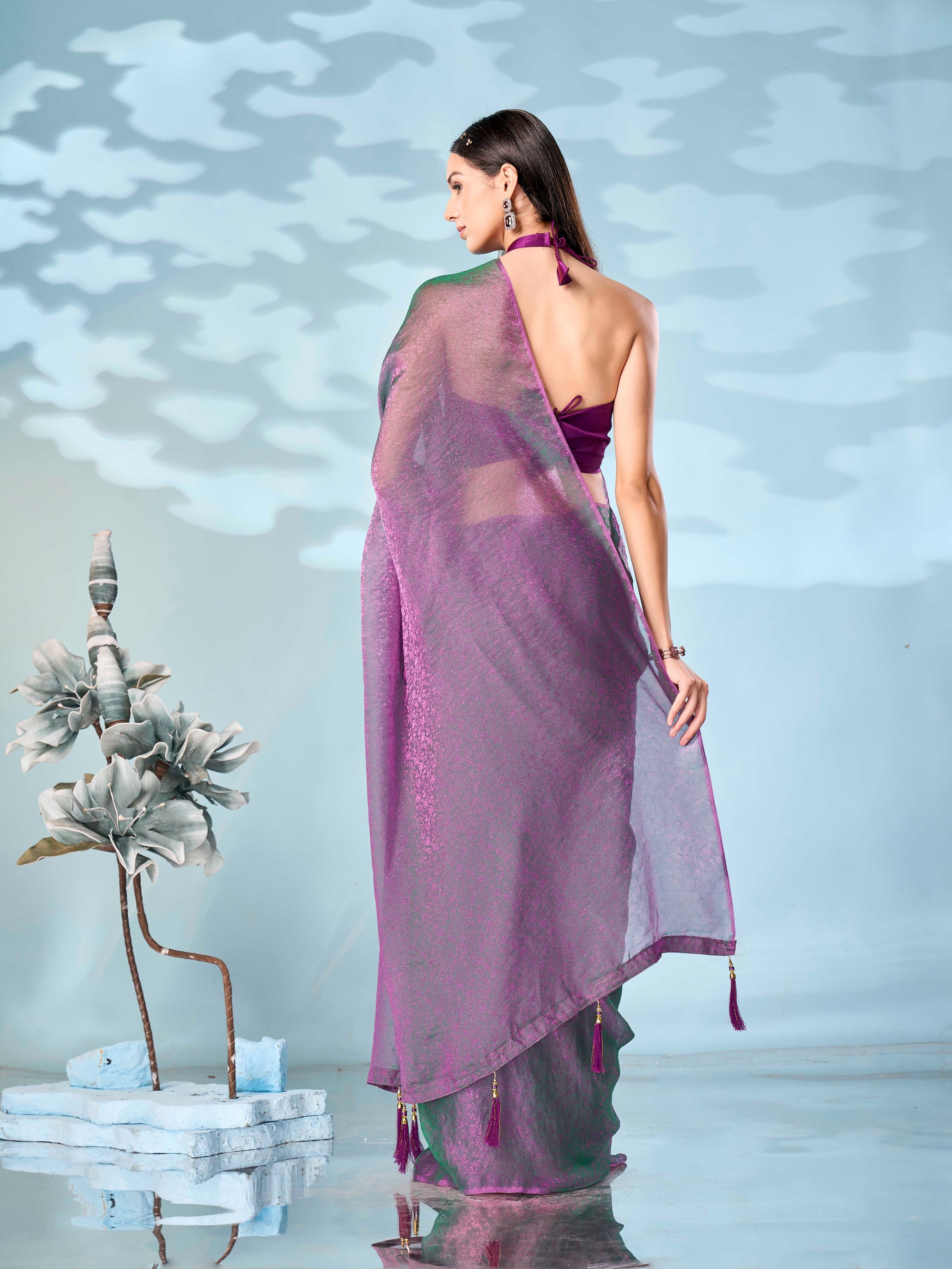 Two tone pink and green colored woven saree with tassles on pallu